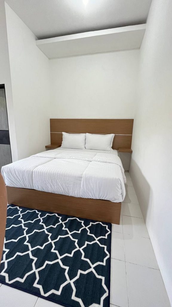 Kamar nyaman di Wisma Apollo, hotel di Kuala Kurun